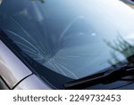 broken car windshield, chipped and damaged car glass, copy space