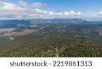 Small photo of Siberian taiga from a bird's eye view. Taiga in summer. Forest landscape from above. Photos of the Republic of Mountain Altai in summer, Red Mountain, aerial photography, Russia