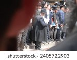 Small photo of Bnei Brak, Israel, 03202022, ultra-Orthodox, policemen and photographers at the funeral of Rabbi Chaim Kanievsky zatza"l