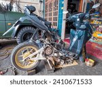 Small photo of Lamongan, Indonesia - January 10, 2024 : black Honda Vario motorbike engine dismantling workshop The condition of the Honda Vario motorbike has been dismantled and ready to be serviced