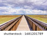 Wooden Boardwalk Going Over The ...