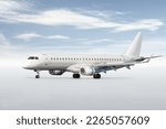 White passenger airliner on the runway isolated on bright background with sky