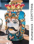 Small photo of Sicilian Ń�eramic King vase in the form of head (Moors head) in the vintage market. Sicilian tradition art