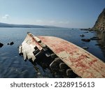 Small photo of abandoned to its old fate, the boat succumbed to the waves