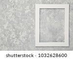 empty white frame on a gray... | Shutterstock . vector #1032628600