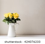 Yellow Roses In White Jug On...