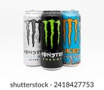 Small photo of DRESDEN, GERMANY - 29. December 2023: Monster energy most popular flavors. The Original energy drink, Ultra White and Mango Loco together. Sweet and fruity lifestyle beverages isolated on white.