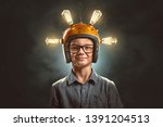 Clever kid with light bulb helmet 