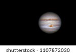 The giant planet Jupiter with great red spot near the center of the disk