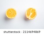 Two Halves Of An Orange On A...