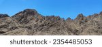 Small photo of The desert of Egypt, South Sinai Governorate, natural mountains and rocks, with their amazing and wondrous landscapes and shapes, and clear blue skies