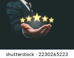 Small photo of Customer evaluation feedback. men in suit Giving Positive Review for Client's Satisfaction Surveys. giving a five star rating. Service rating, satisfaction concept.