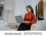 Small photo of Asian women own design and tailoring shops, women's clothing business owners, sell clothes online on websites and do live sales via social media. Business ideas for selling clothes and selling online.