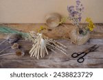Small photo of ritual doll made of straw, grass in honor rich harvest, scarecrow for fertility, old toy, amulet for children, folk art harvesting, ritual object symbolism of disguised character, pagan ritual tree