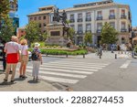 Small photo of GRANADA, SPAIN - MAY 20, 2017: This is a monument to Queen Isabella of Castile and Christopher Columbus, created for the 400th anniversary of the Columbus expedition on the Isabella of Castile Square.