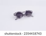 Small photo of This pair of transparent glasses is a stylish expression of contemporary fashion. With a design that blends subtlety and boldness, these glasses feature a clear frame that creates a sense of lightness