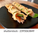 Small photo of Openwork pancakes Gossamer with salted salmon.
