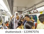 Small photo of DELHI, INDIA - OCTOBER 16: passengers ride in metro train on October 16, 2012 in Delhi, India. Nealy 1 million passengers use the metro daily.