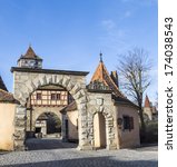 Small photo of famous Roeder gate in Rothenburg ob der tauber