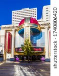 Small photo of RENO, USA - JUNE 17, 2012: facade of Harrahs casino in Reno, USA. William F. Harrah opened his first bingo parlor in 1937 as the first casino in Reno.