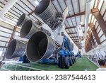 Small photo of Houston, USA - October 22, 2023: inside hangar with SATURN V Rocket in Space Center - The Lyndon B. Johnson Space Center (JSC) in Houston, Texas. close up of Rocket detail with Apollo capsule.