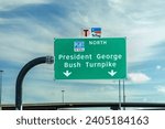 Small photo of Dallas, USA - November 6, 2023: highway signage in green at interstate direction George Bush turnpike in Dallas, Texas, USA.