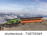 Small photo of MT WASHINGTON, NH, USA - SEP 19, 2017: Mount Washington Cog Railroad at the top of Mount Washington in White Mountain in fall, New Hampshire, USA.
