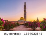 Middle East, Arabian Peninsula, Oman, Muscat. Sunset view of the Sultan Qaboos Grand Mosque in Bawshar,Muscat.