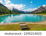 Turquoise water alpine lake in Dolomites mountains, Italy. Lago Son Forca in Italian Alps in sunny day, Summer vacation destination