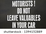 Small photo of Sign to inform motorists that it would be very unwise to leave any valuables in their cars