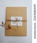 Small photo of A beautiful and unique package with flowery greeting card. Can be use to a gift for someone. Flowery package.