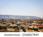 Small photo of view of Duhok city and it is building in the daylight , A view of the Kurdish city of Duhok in the Kurdistan region of Northern Iraq ,the city lies nestled in a valley between two small mountain range