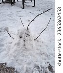 Small photo of Snowmen made by children (interesting snowmen)