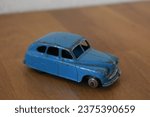 Small photo of Hilversum, the Netherlands - April 23, 2020: a playworn Dinky Toys Standard Vanguard toy car