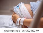 Childbirth and labor. A pregnant woman in the hospital having contractions and tests.