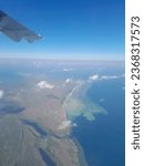 Small photo of Mayday, maluku island from airplane