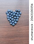 blueberries laid out on a... | Shutterstock . vector #2063100356