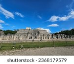 Small photo of The Temple of the Warriors is a mayan structure 40 feet high and 133 feet wide. The central temple shows bas-reliefs of warriors, eagles and jaguars devouring human hearts.