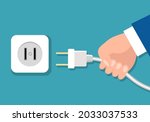 hands electric plug. flat hand... | Shutterstock .eps vector #2033037533