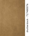 brown leather background | Shutterstock . vector #717480076