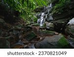 Small photo of Beautiful waterfall in the rainforest at Phu Soi Dao national park in Uttaradit province Thailand.