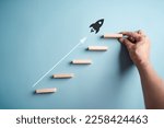 Small photo of Shortcut Exponential growth or compound interest, investment fast track into staircase, wealth or earning rising up graph increasing profit financial concept.