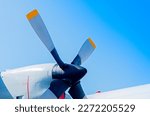 Airplane turboprop engine with propeller on blue sky background, Beautiful color view of the plane.