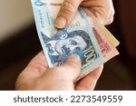 Peru banknotes, Passing money from hand to hand, Finance and business concept, Passing cash to each other, Finance and business in Peru