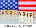 US elections 2024, American flag and the word VOTE 2024. The concept of voting in the United States 