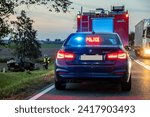 Small photo of 3.10.21 Poland. Krzywizna. Road accident. Undercover police car with emergency lights.