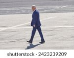 Small photo of NEW YORK, NY - FEBRUARY 7, 2024: President Joe Biden walks across the tarmac from Air Force One to Marine One at JFK International on the way to fundraisers in NYC.