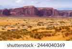 Desert fields and buttes in...