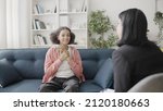 Small photo of Psychologist talking to happy teenager, adolescent counseling service, help