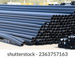 Small photo of PE pipe plant, Industrial PE pipeline for gas and water. HDPE pipe, Polyethylene PE100 pipe. Polyethylene pipe plant